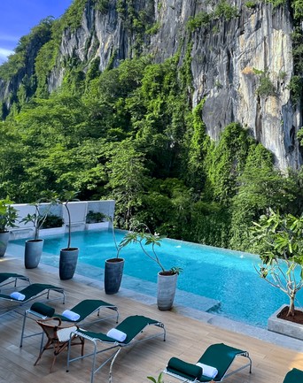 Pool beneath limestone cliffs at Amari by Vivere